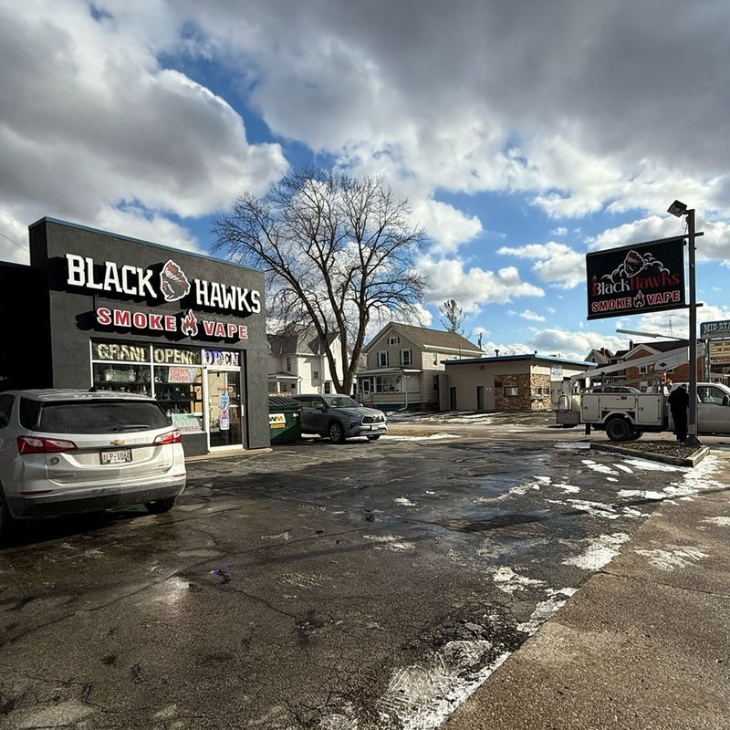 BlackHawks — Full Storefront Branding — Magic Sign Design Chicago