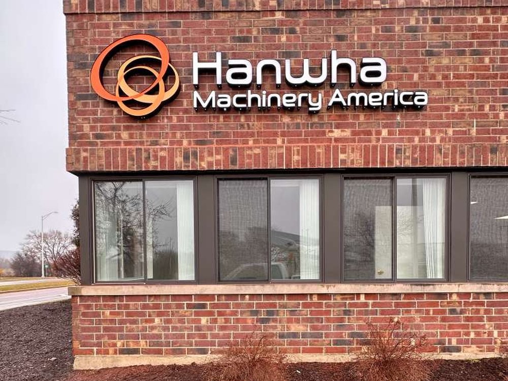 Illuminated channel letters and dimensional logo installed for Hanwha Machinery America